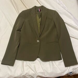 Brand new Tommy Hilfiger suit coat size 6. Never worn and still with tags.